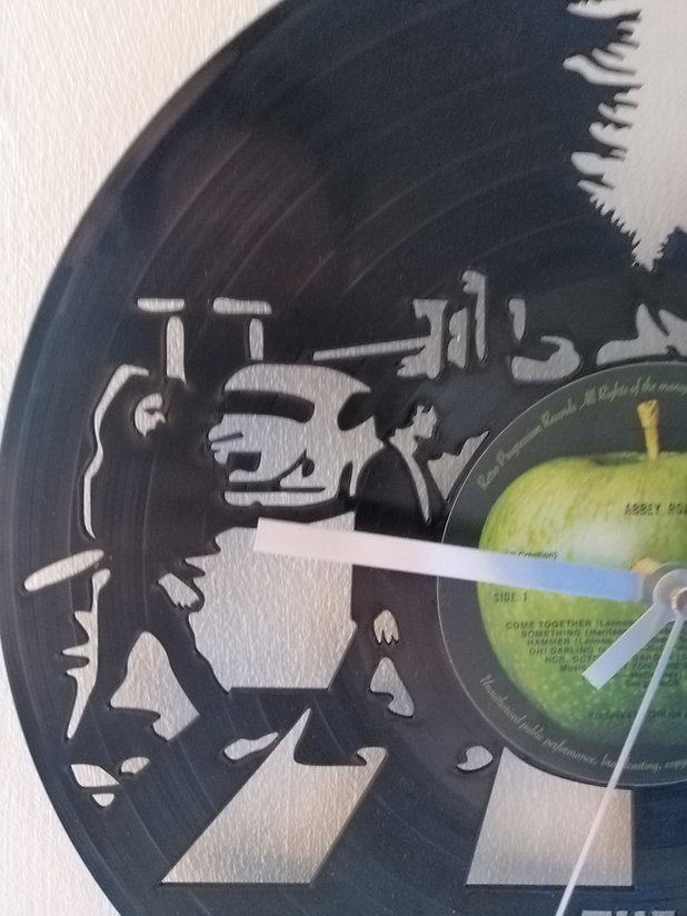 The Beatles Abbey Road Album Cover Vinyl Clock close up 1 The Beatles Abbey Road Album Cover Vinyl Clock close up 1